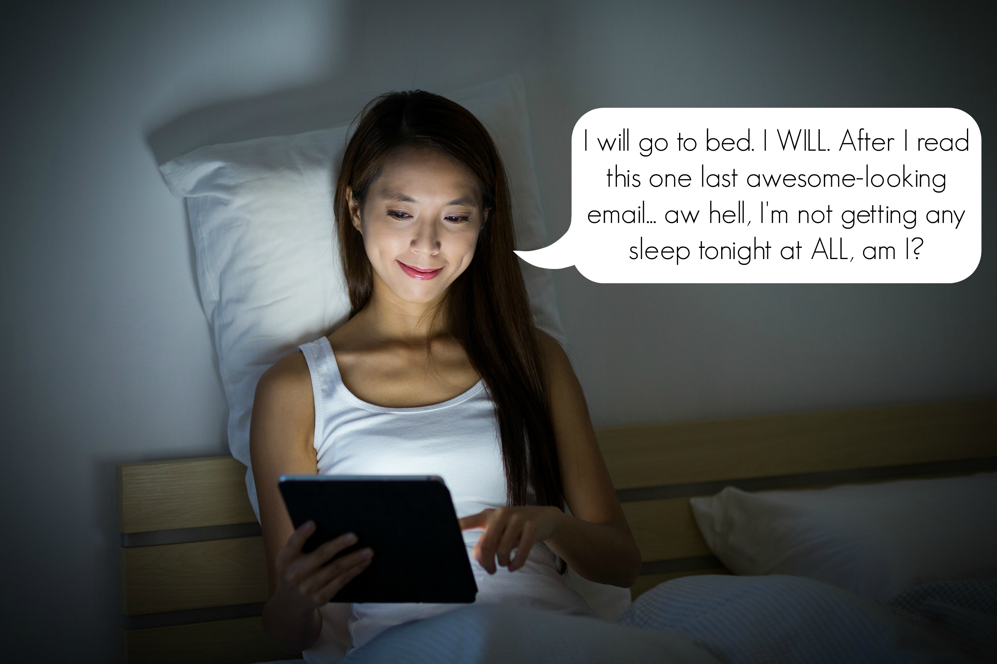 Woman checking email before bed time
